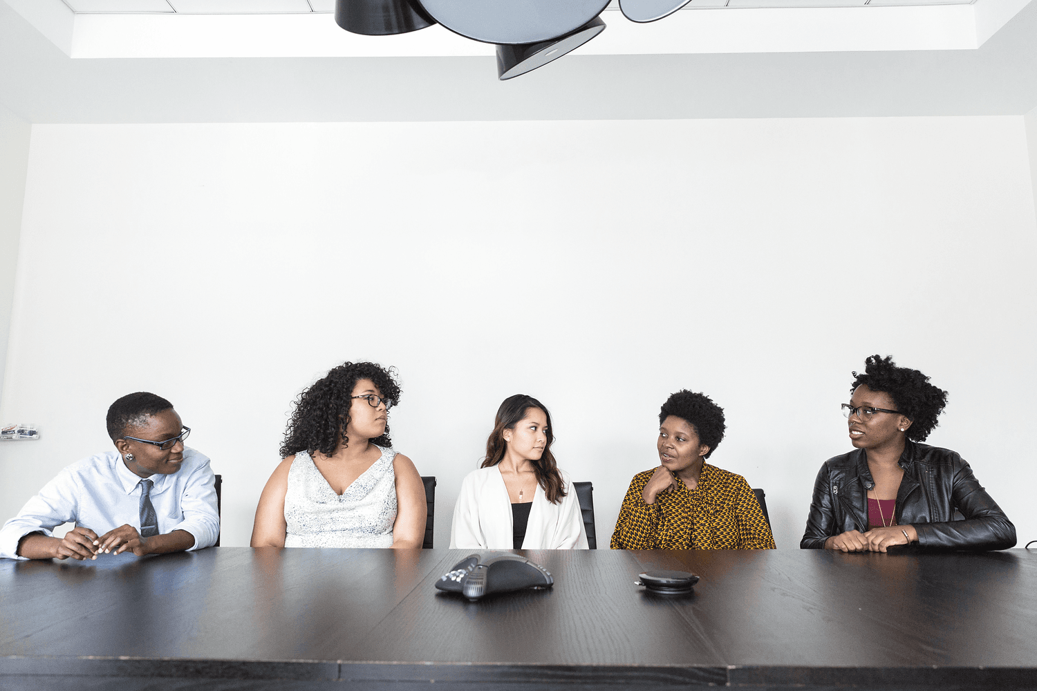 Editorial collaborative finance workspace — not portraits of named individuals
