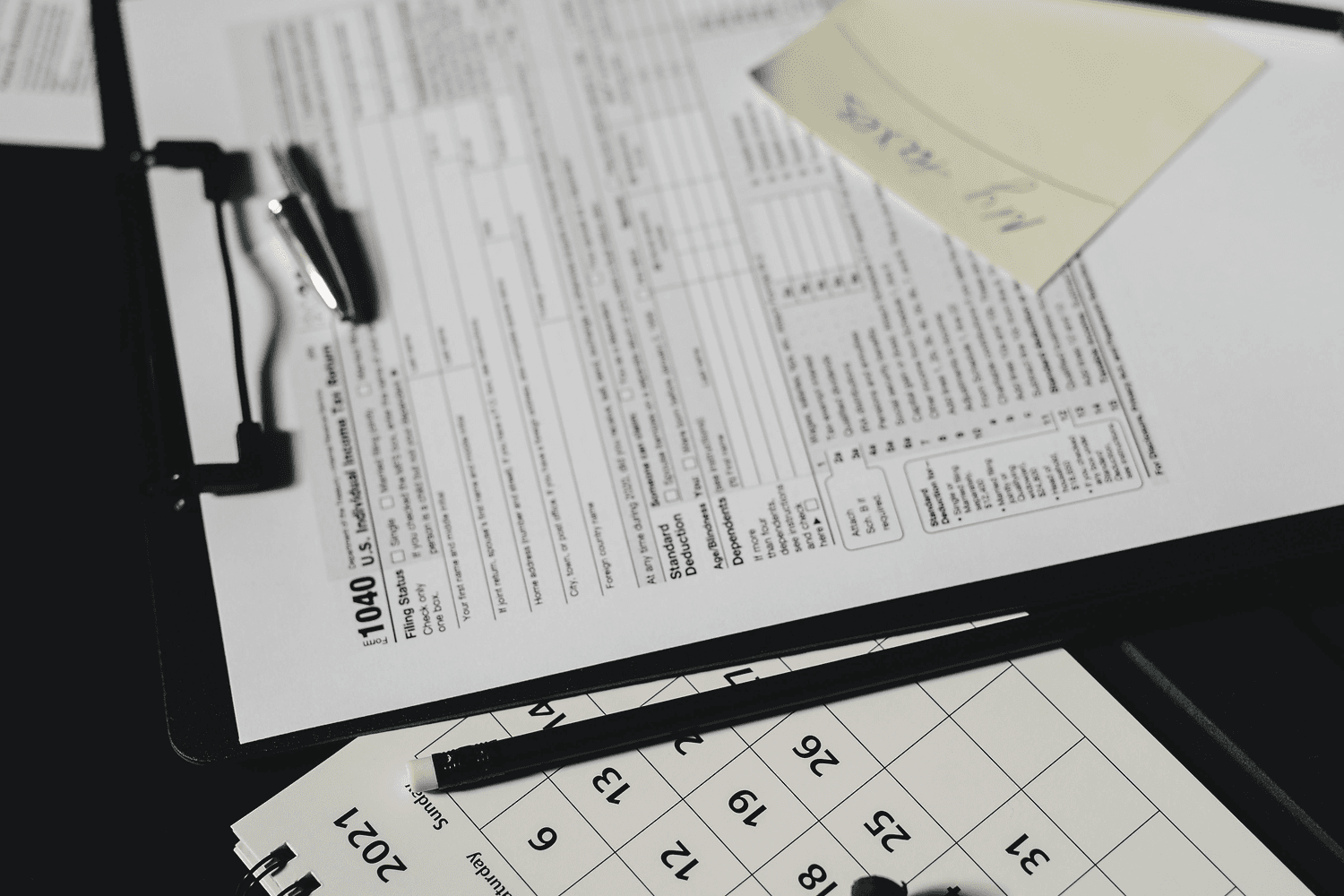 Management report and financial statements laid out on a bright meeting table